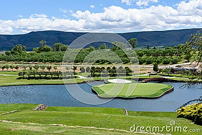 YAKIMA, WA/USA â€“ JUNE 5, 2021: signature hole #17 at Apple Tree Golf Course on a sunny summer day Stock Photo